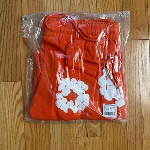Men's Athletic Orange Shorts by Denim Tears